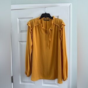 Yellow ruffle blouse